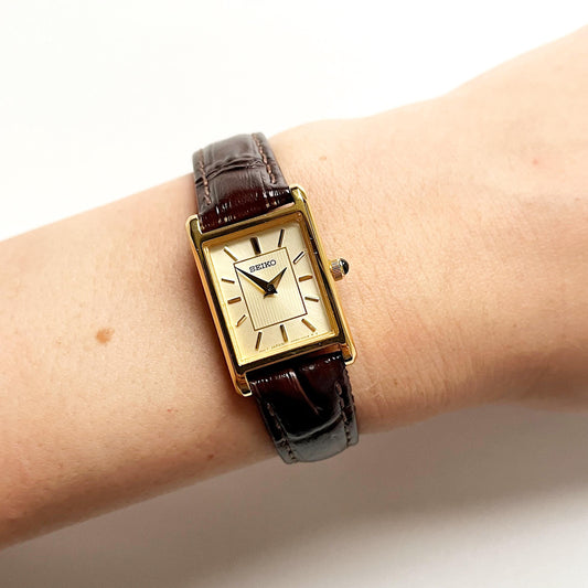 New Seiko - Gold face watch, leather strap, boxes, vintage ledies watch